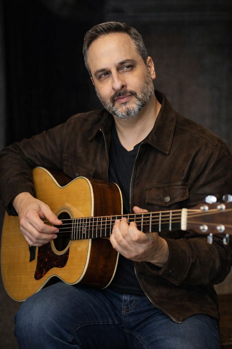 Jean Carlos Heigl Garcia – Latin Musiker Wien spielt Gitarre